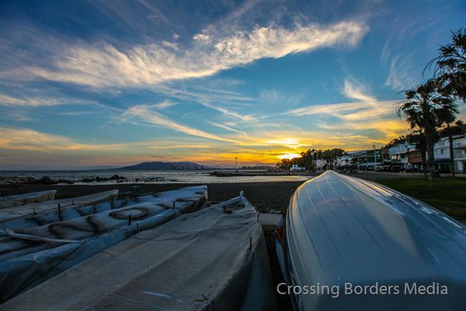 Sunset-on-the-beach-of-Malaga--Spain by Crossing Borders Media
