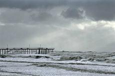 Poster print of Stormy Ocean at the Pier by the artist Shooting the Pier